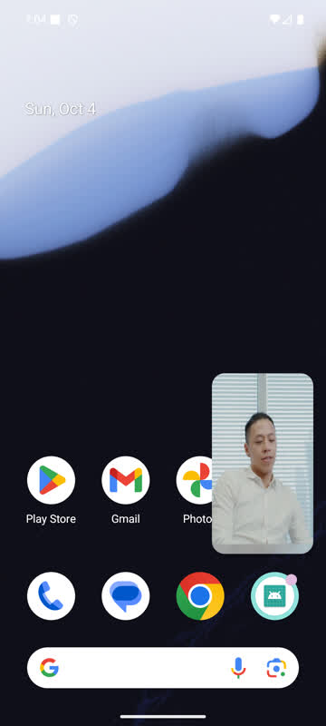 Android system picture-in-picture showing the active video call over the launcher